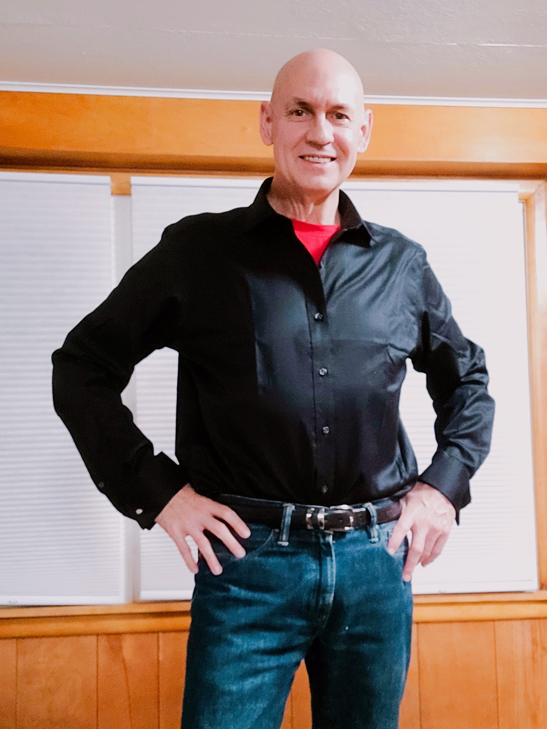 2021-07-a-jr-standing-black-shirt-jeans