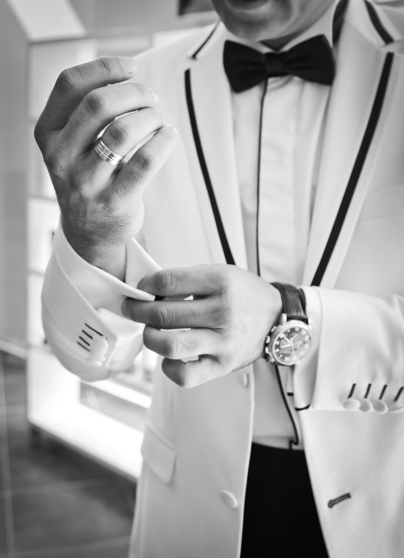 man-wearing-tuxedo-in-grayscale-photography-38270